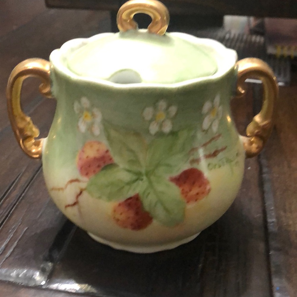 Vintage sugar bowl strawberries on it